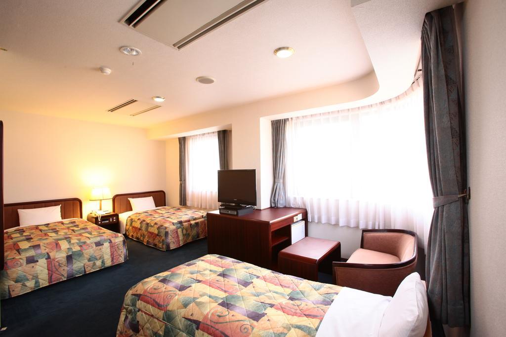 Hotel Ermou Regency Нумадзу Стая снимка